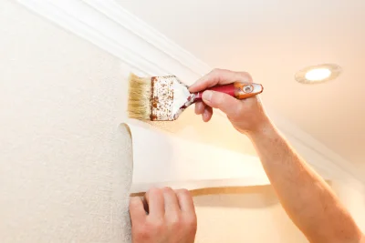 Pose de papier peint à Larchamp — revêtements muraux et toiles de verre